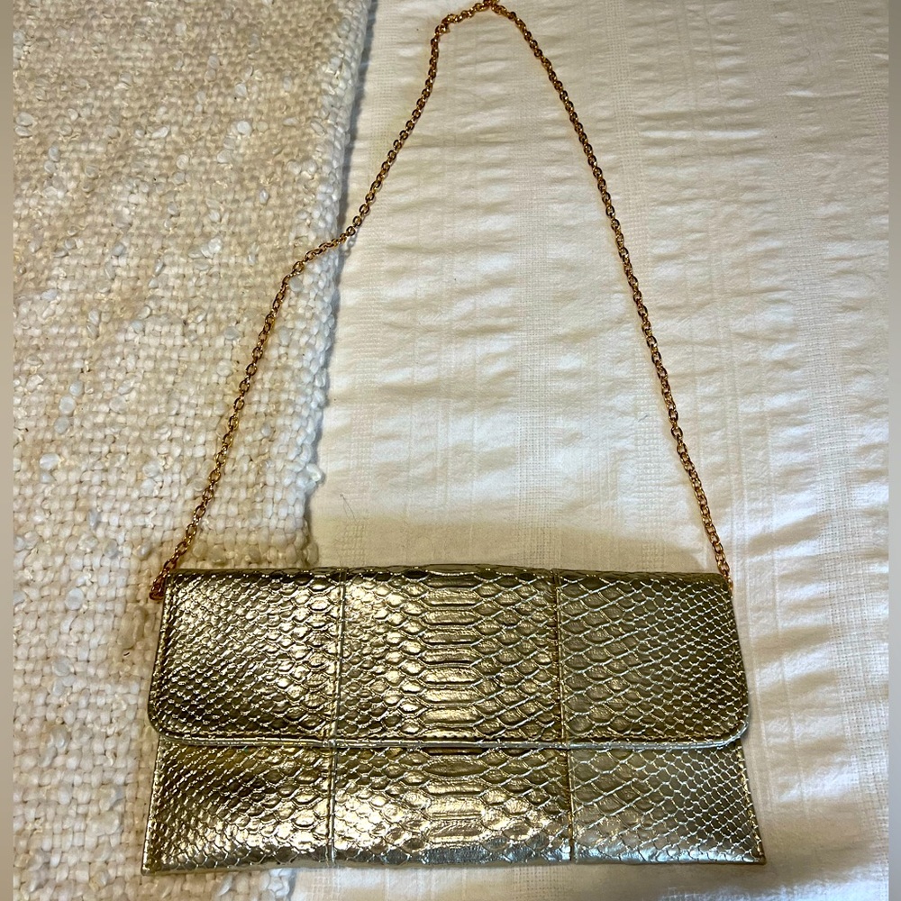 Gold snakeskin clutch